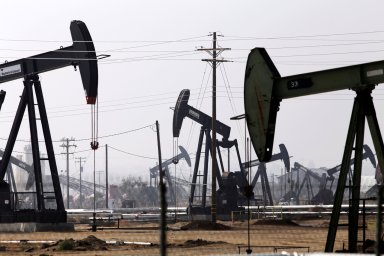 FILE PHOTO: Oil drills are pictured in the Kern River oil field in Bakersfield