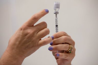 People receive COVID-19 booster vaccination in Michigan