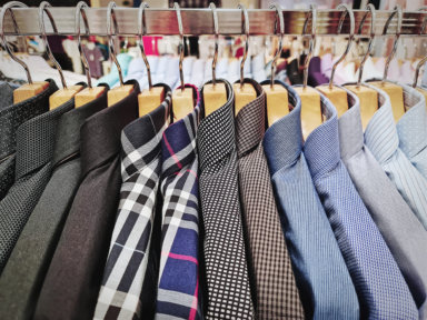 Collection of Men’s Formal Shirts Hanging on the Rack