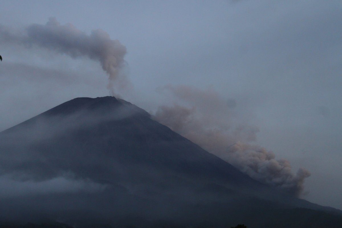 Mount Semeru spews hot clouds as seen from Pronojiwo