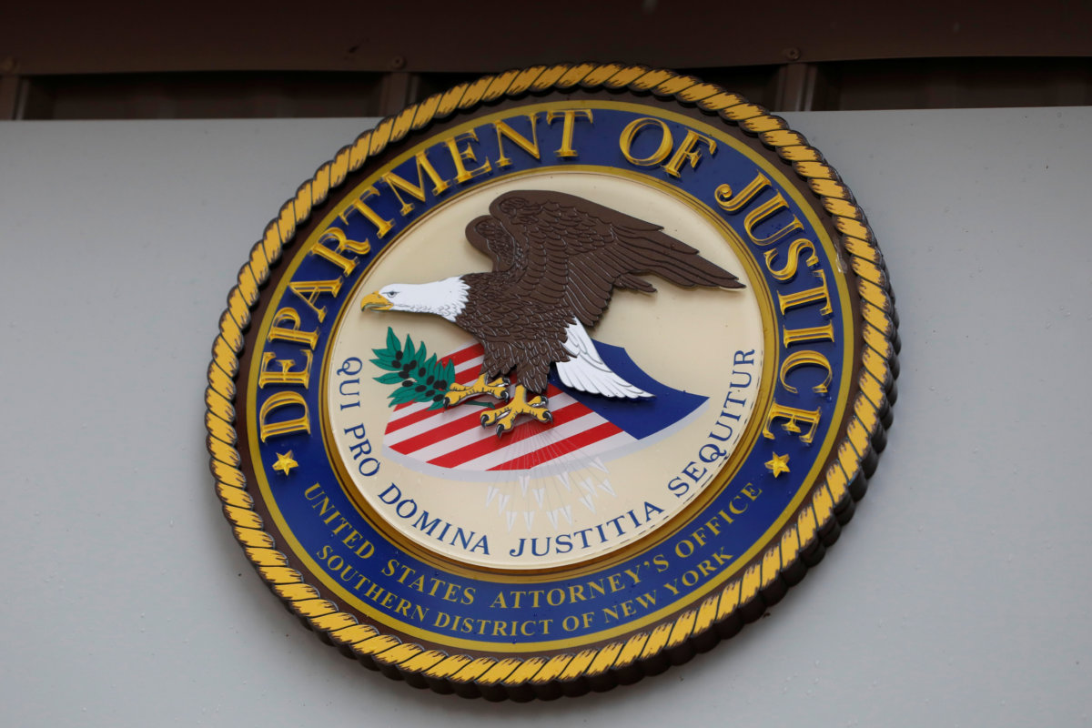 The seal of the United States Department of Justice is seen on the building exterior of the United States Attorney’s Office of the Southern District of New York in Manhattan, New York City