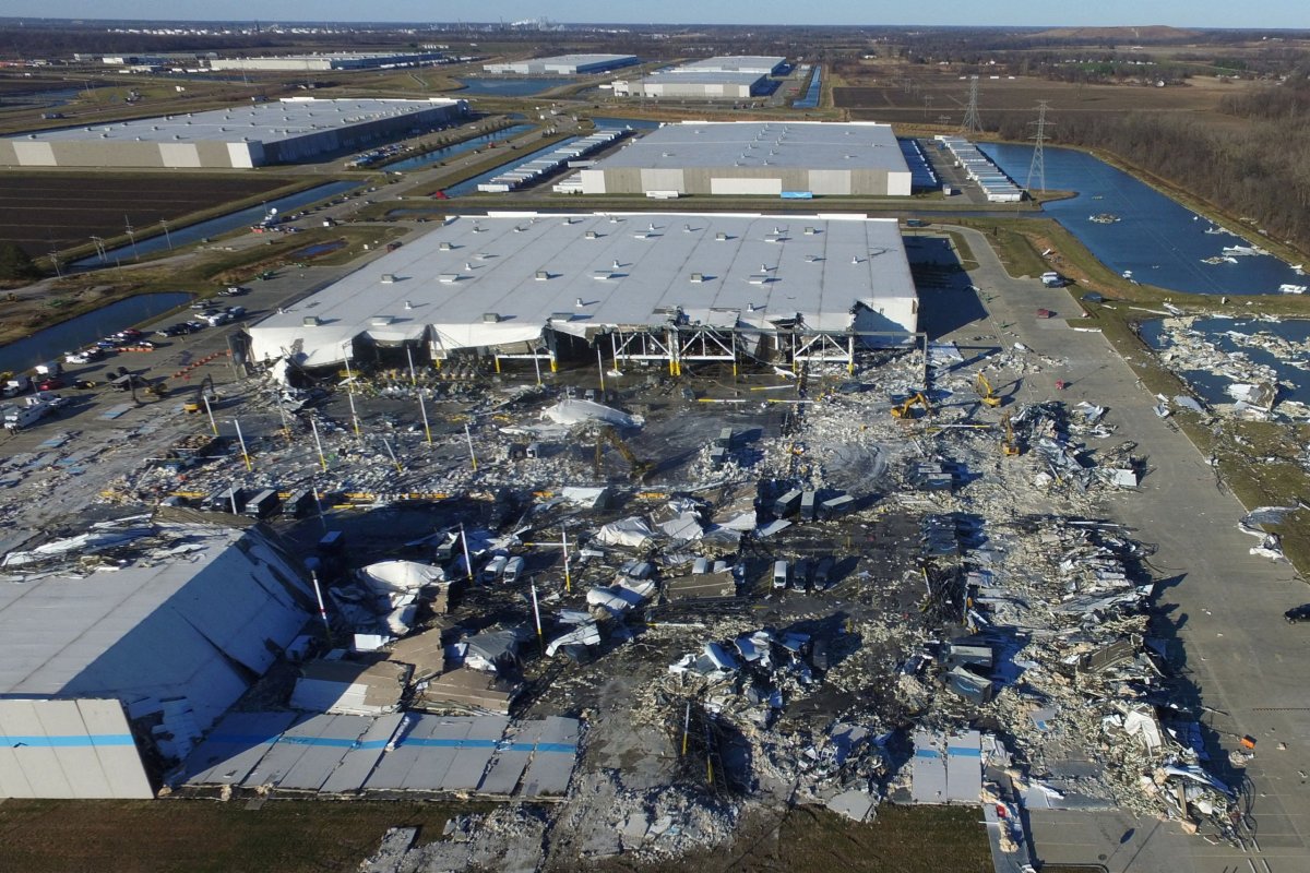 Emergency vehicles surround the site of a roof collapse at an Amazon distribution centre in Edwardsville