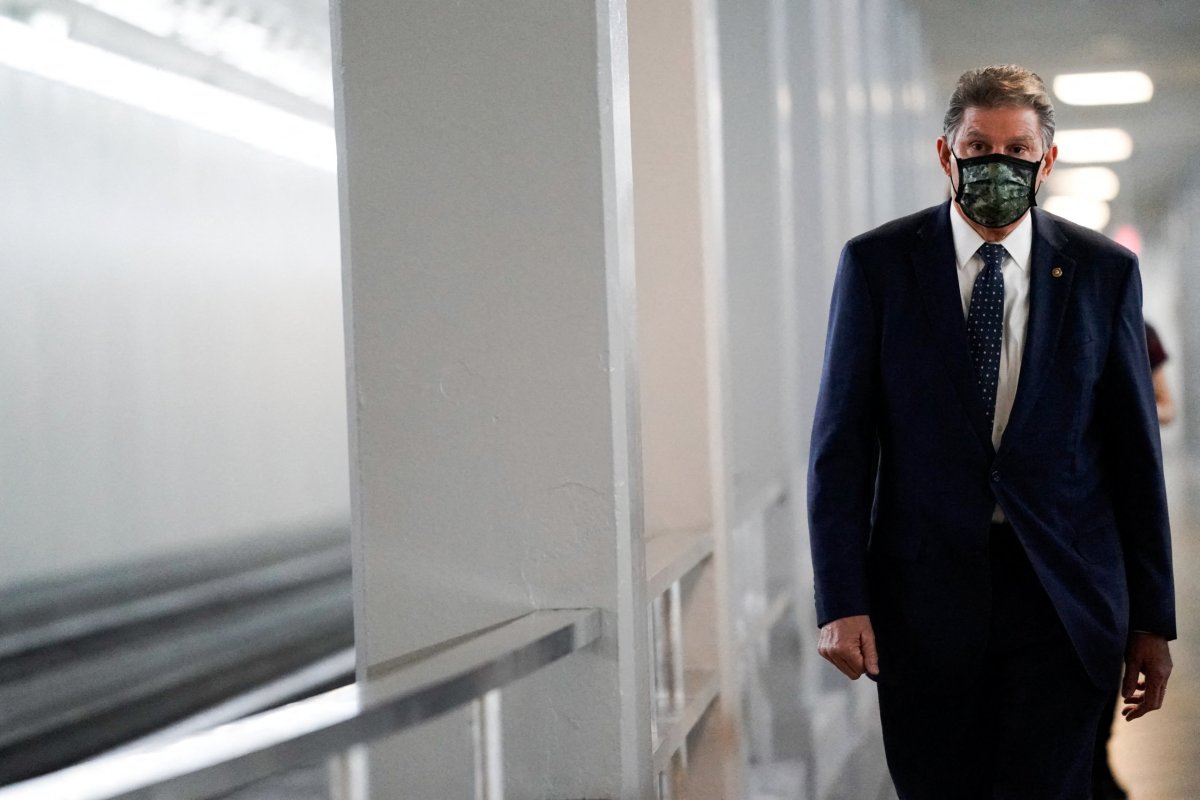 U.S. Senator Joe Manchin (D-WV) walks to a Democratic policy luncheon at the U.S. Capitol in Washington