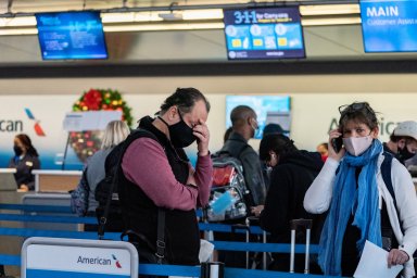 Passengers line up at John F. Kennedy International Airport in New York