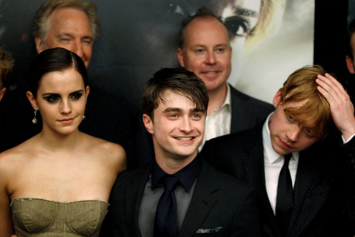 FILE PHOTO: Cast members Grint, Radcliffe and Watson arrive for premiere of the film “Harry Potter and the Deathly Hallows: Part 2” in New York