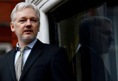 FILE PHOTO: WikiLeaks founder Julian Assange makes a speech from the balcony of the Ecuadorian Embassy, in central London