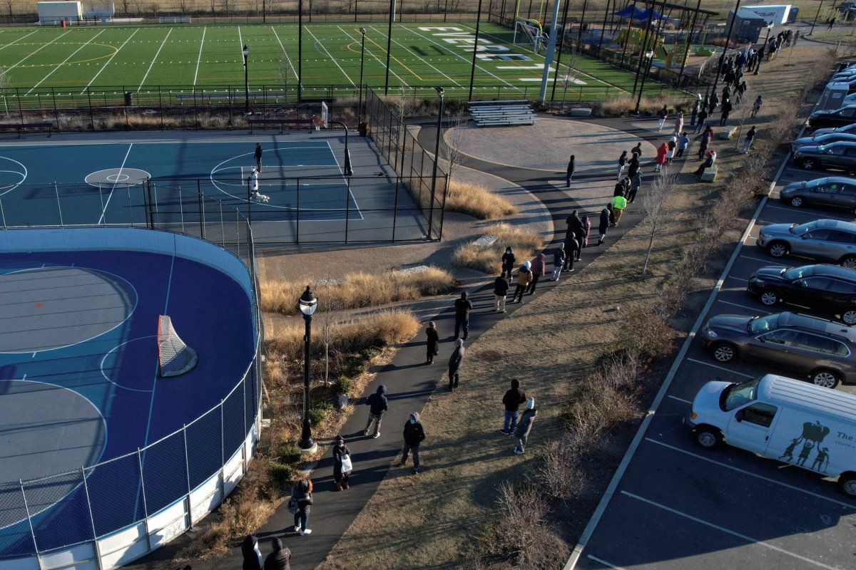 People line up to be tested for COVID-19 in Everett