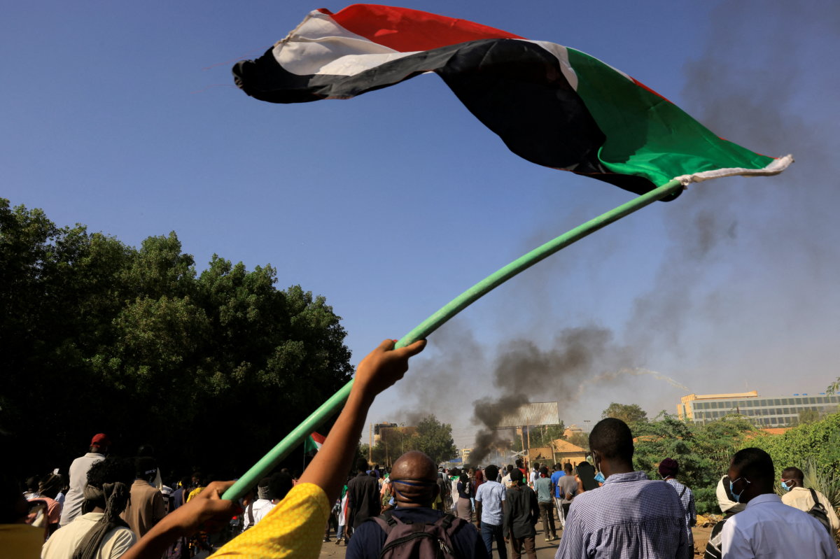 Protesters march during a rally against the military rule following last month’s coup, in Khartoum