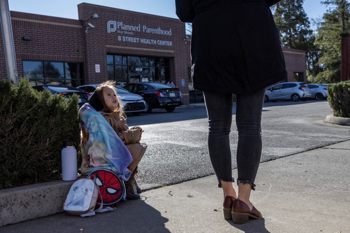 Local residents attend a weekly protest outside the Planned Parenthood Health Center in Sacramento, California