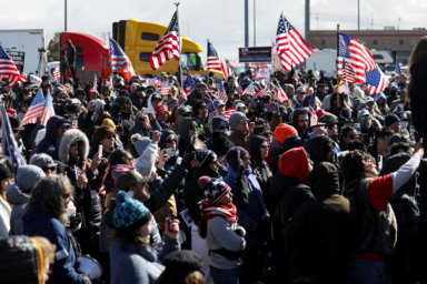 Truckers and their supporters form a convoy bound for the nation’s capital from California