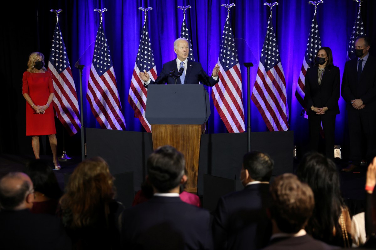 FILE PHOTO: U.S. President Biden attends a holiday celebration for Democratic National Committee, in Washington