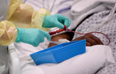 FILE PHOTO: Medical staff treat seriously ill COVID-19 patients at Milton Keynes University Hospital, amid the spread of the coronavirus disease (COVID-19) pandemic, Milton Keynes
