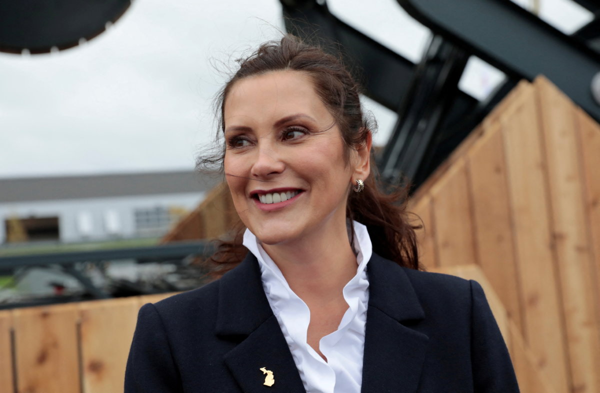 FILE PHOTO: Michigan Governor Gretchen Whitmer visits the Ford Bronco off-road track during the Motor Bella 2021 auto show in Pontiac, Michigan