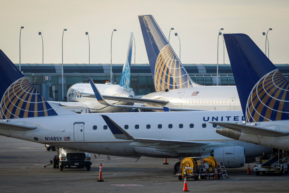 FILE PHOTO: United Airlines planes are parked at their gates at O’Hare International Airport ahead of the Thanksgiving holiday in Chicago, Illinois