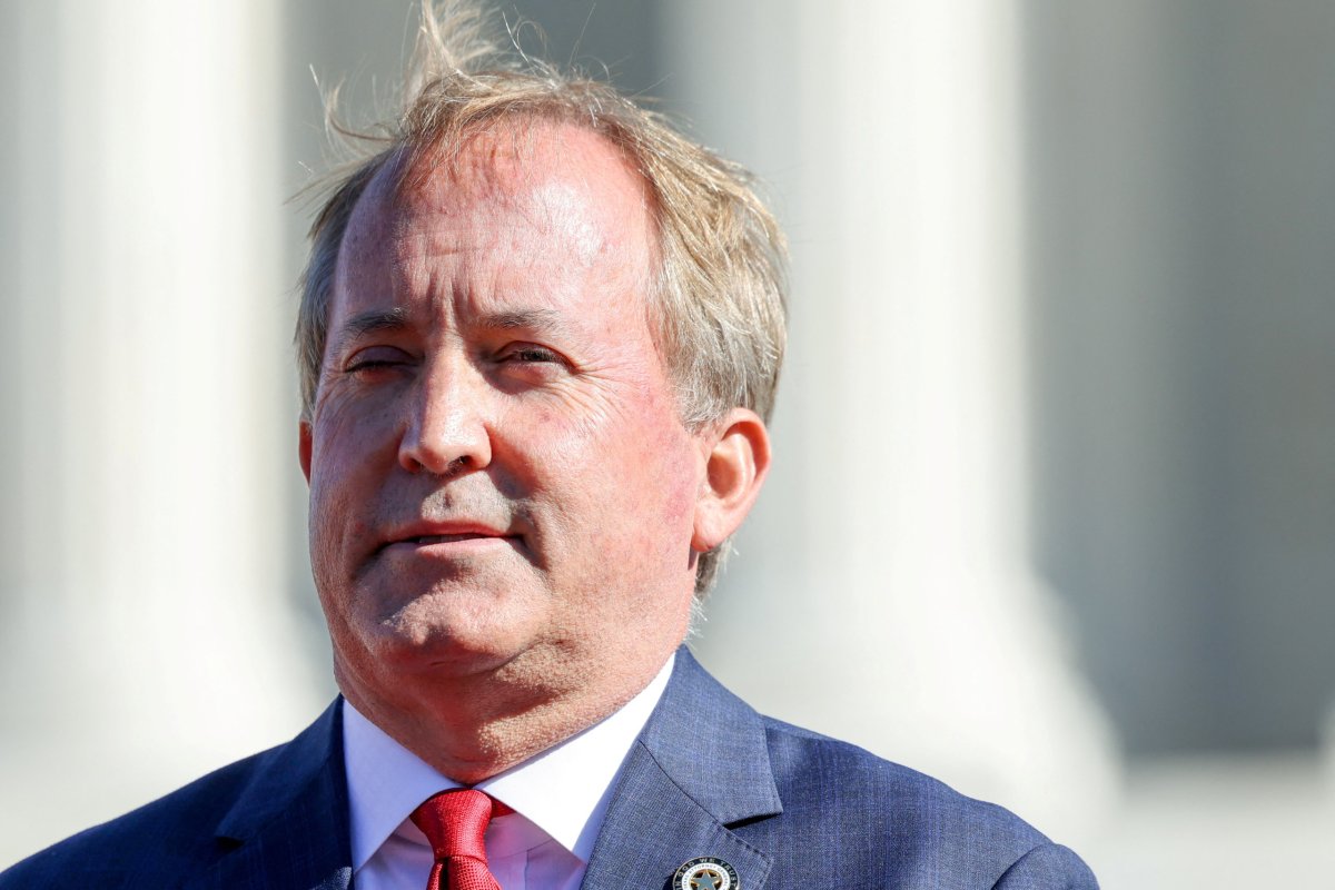 FILE PHOTO: Texas Attorney General Ken Paxton speaks to anti-abortion activists outside the U.S. Supreme Court, in Washington