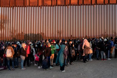 Migrants cross the border in Yuma, Arizona