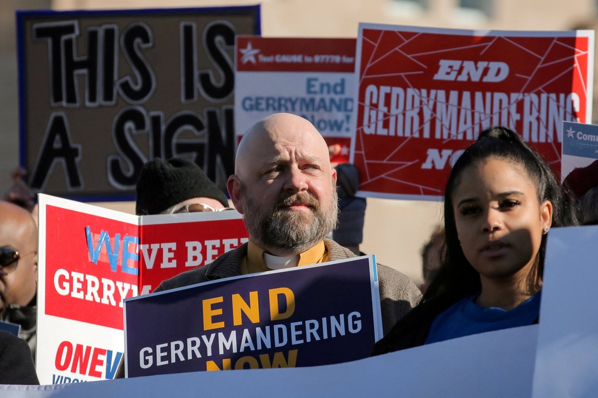 FILE PHOTO: Demonstrators protest during a Fair Maps rally outside the U.S. Supreme Court, in Washington