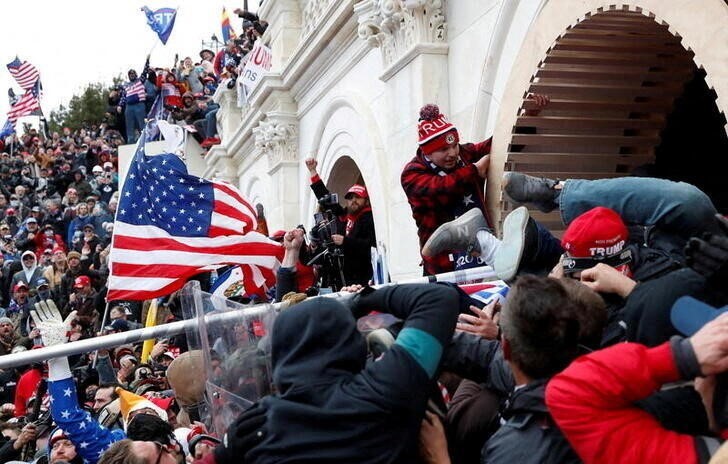 FILE PHOTO: Supporters of U.S. President Donald Trump gather in Washington