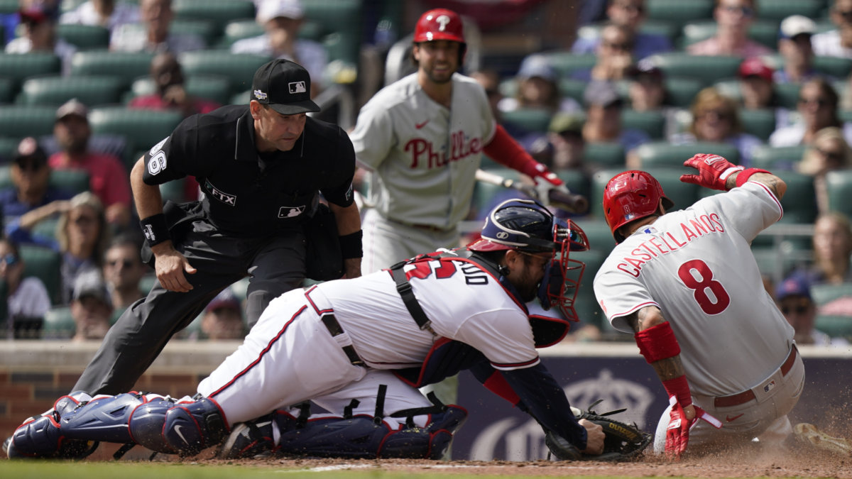 Segura's hit helps Phils walk off with 10-inning opening win vs Braves